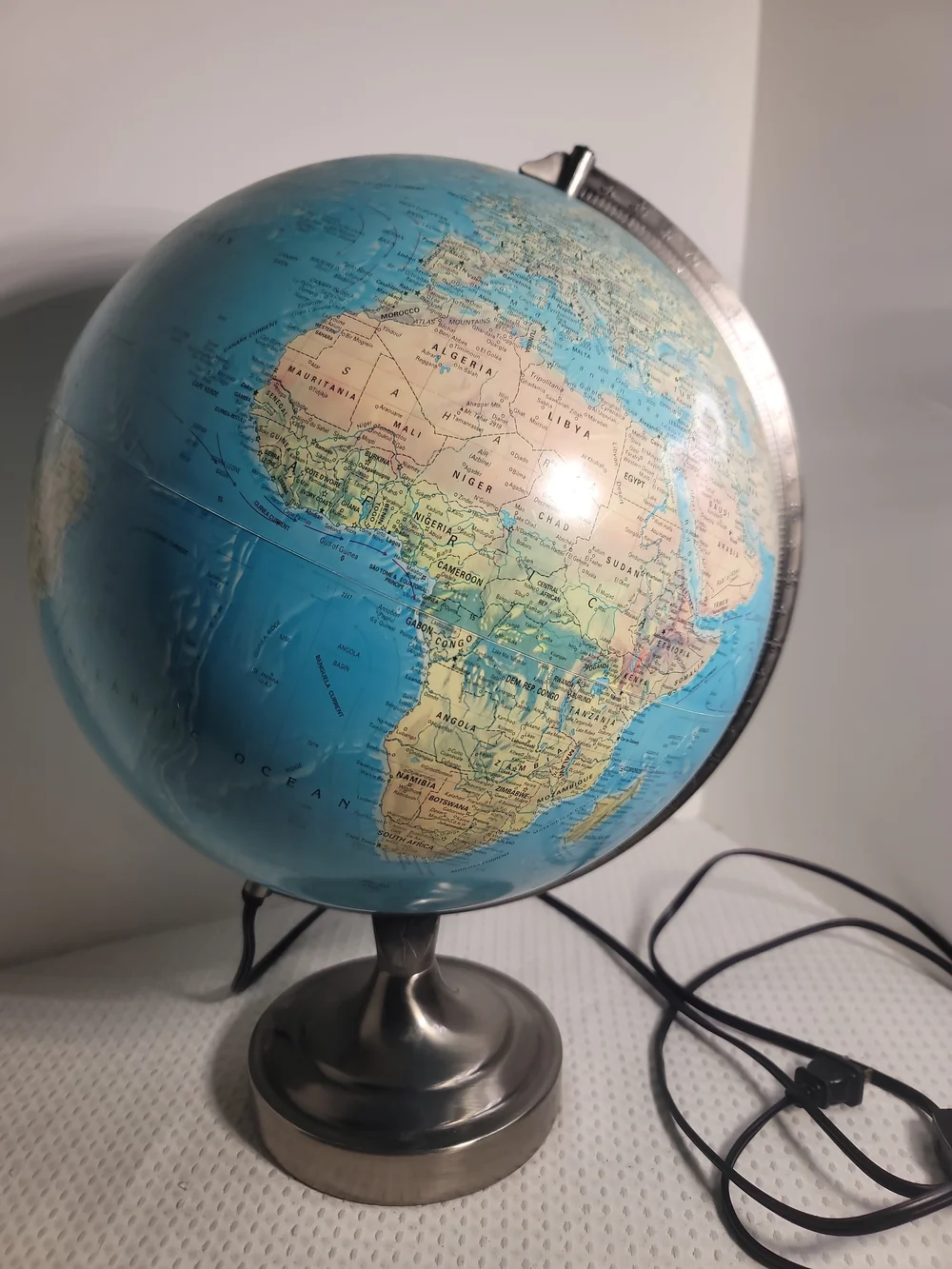 Illuminated Blue Table Globe on Metal Stand